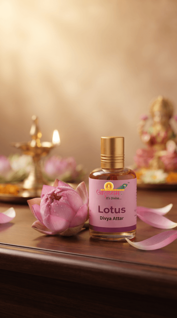 Aradhyam Lotus Divya Attar bottle with a lotus flower and diya for pooja